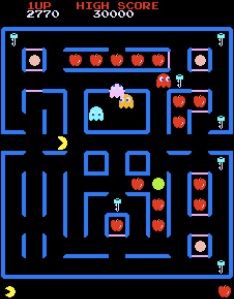The first level of Super Pac-Man, after some apples have been eaten. Note how the tunnels' gates are gone -- make sure both gates have been opened before you attempt to enter a tunnel, or you could be in for a nasty surprise.